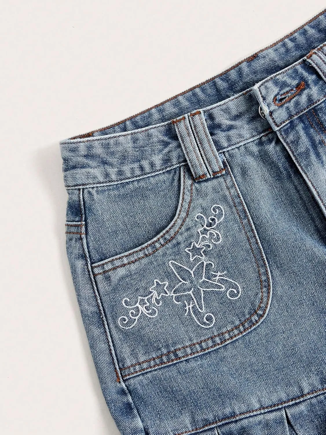 WDIRARA Women's High Waist Star Embroidery Short Skirts Pleated Hem Denim A Line Mini Skirts